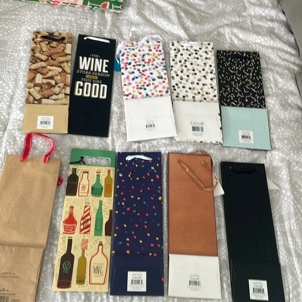 Set of 10 miscellaneous wine gift bags. Great for the upcoming holidays